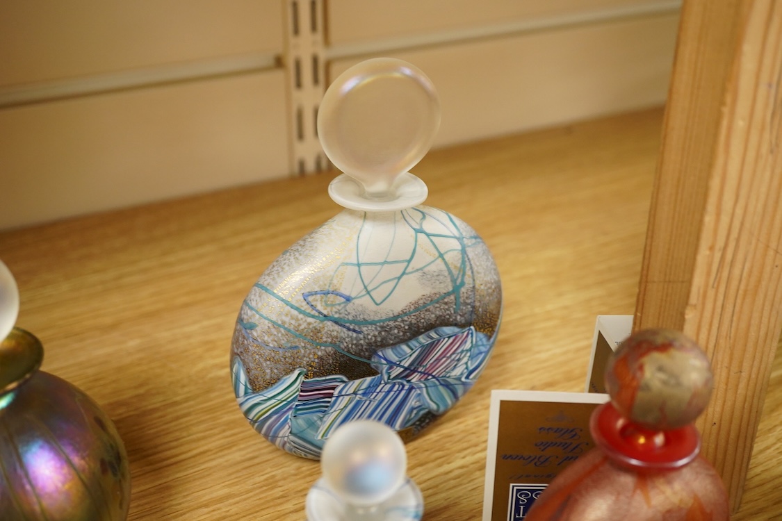 A collection of thirteen Isle of Wight scent bottles, tallest 15cm